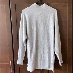 Long turtleneck light grey sweater